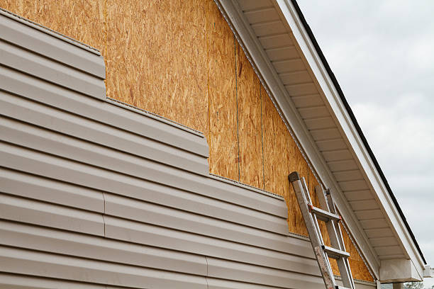 Professional Vinyl Siding technician working in Linwood, PA